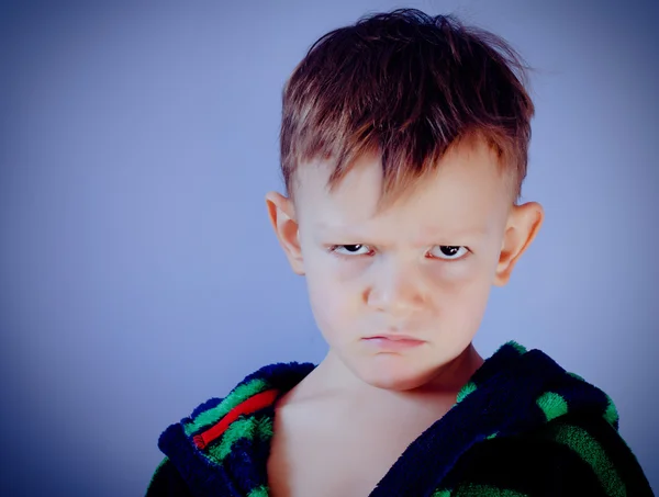 Sulky angry little boy — Stock Photo, Image