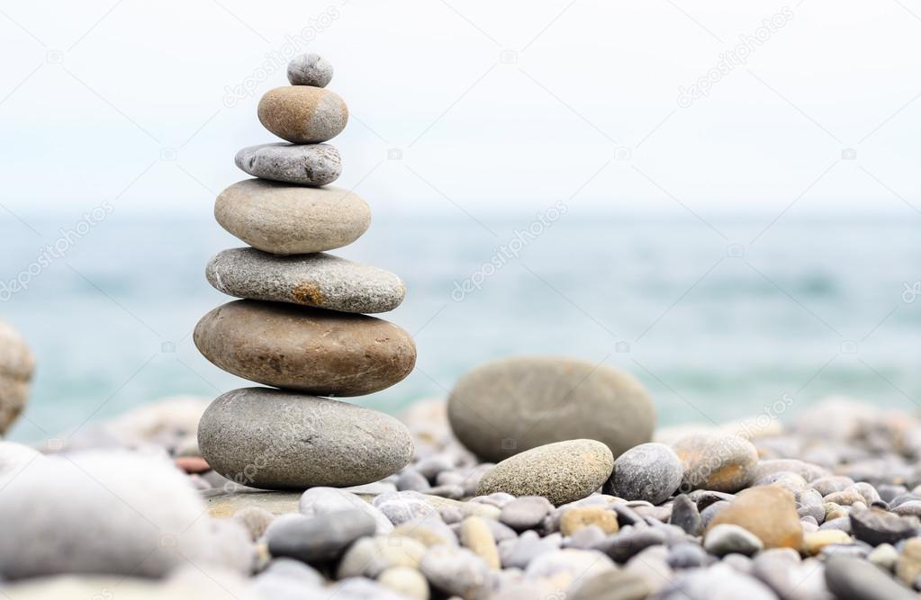 Round Smooth Stones Stacked on Rocky Beach
