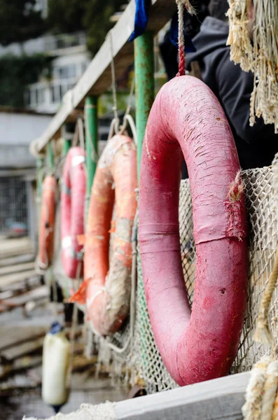 Row of Life Rings hanging on Boat Railing — стоковое фото