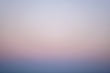 Faded blues and pinks of a sky at sunset