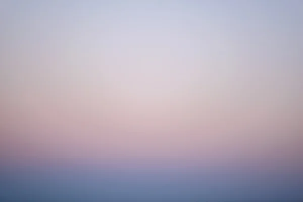 Bleus fanés et roses d'un ciel au coucher du soleil — Photo