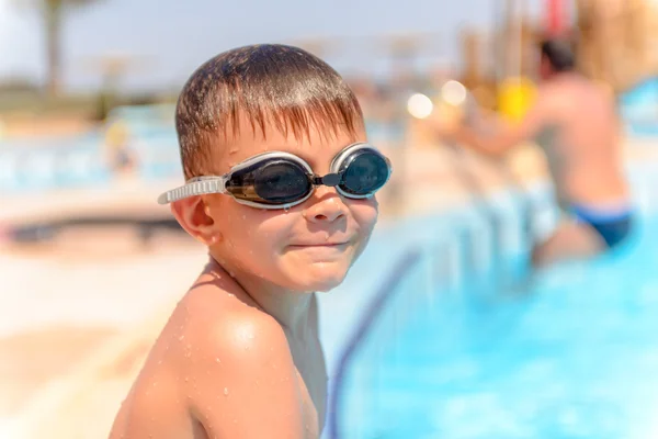 Smiling little boy in swimming goggles — Stok fotoğraf