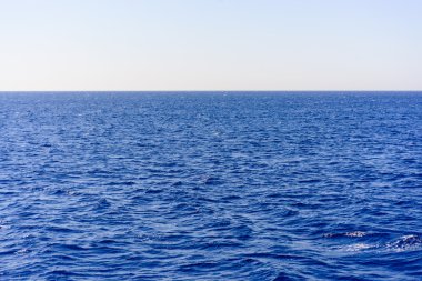 Background texture of a deep blue ocean clipart