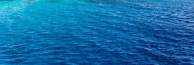 Background texture of a deep blue ocean clipart