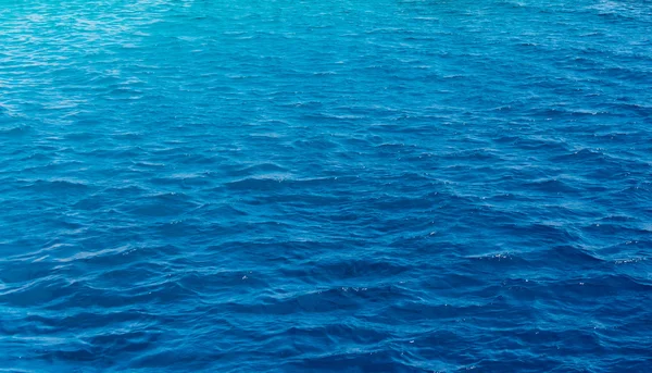 Textura de fundo de um oceano azul profundo — Fotografia de Stock