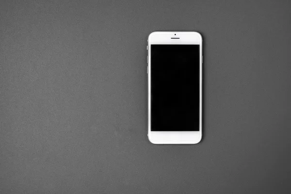 Blank smart phone on grey background — Stock Photo, Image