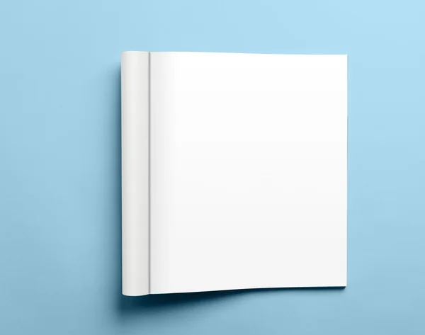 Blank open magazine isolated on blue background — Stock Photo, Image