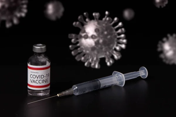 Covid-19 or coronavirus vaccine, syringe and needle on3D rendering virus background.