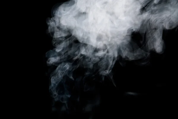 Дым в темноте — стоковое фото