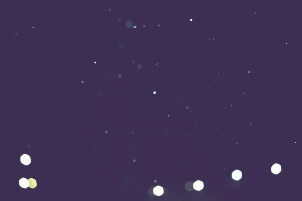 Oskärpa natt snöfall filtreras — Stockfoto