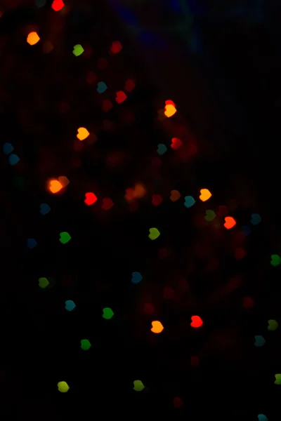 Bokeh colorido em forma de coração — Fotografia de Stock