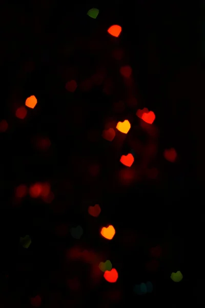 Czerwony pomarańczowy Heartshaped Bokeh — Zdjęcie stockowe