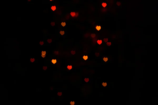 Rood oranje Heartshaped Bokeh — Stockfoto