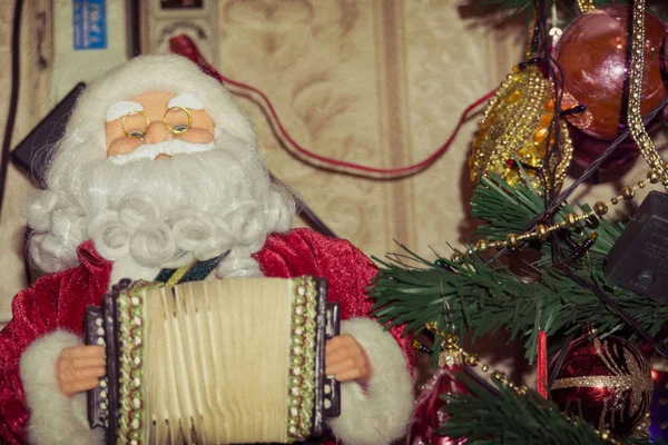 Retro hračky Santa s akordeonem — Stock fotografie