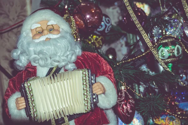 Retro hračky Santa s akordeonem — Stock fotografie