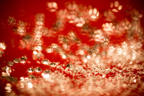 Glitters de prata em rosa — Fotografia de Stock