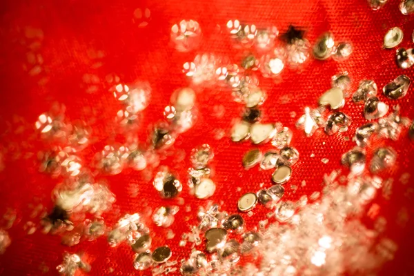 Glitters de prata em rosa — Fotografia de Stock