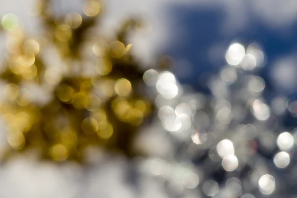 Copo de nieve de oro y plata borrosa —  Fotos de Stock