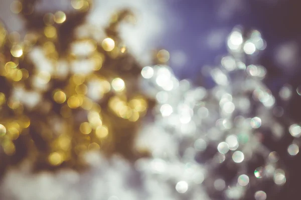 Verschwommenes goldenes und silbernes Schneeflockenretro — Stockfoto