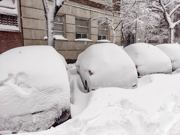 Cars trapped in the snow after a storm