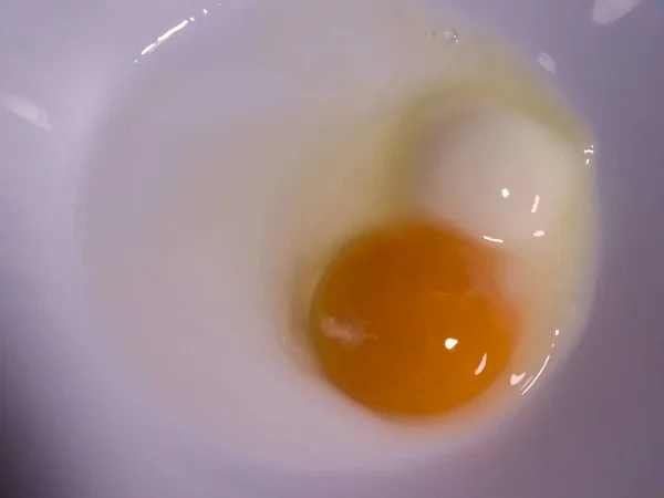 Strange Egg One Orange One White Yolk Selective Focus — Stock Photo, Image