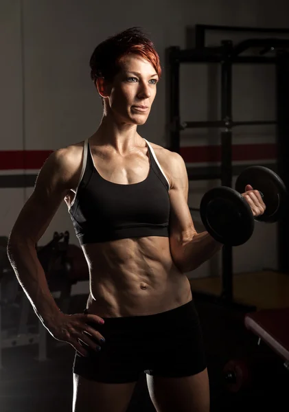 Young fit caucasian female bodybuilder — Stock Photo, Image