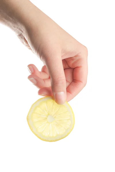 Segurando fatia de limão — Fotografia de Stock