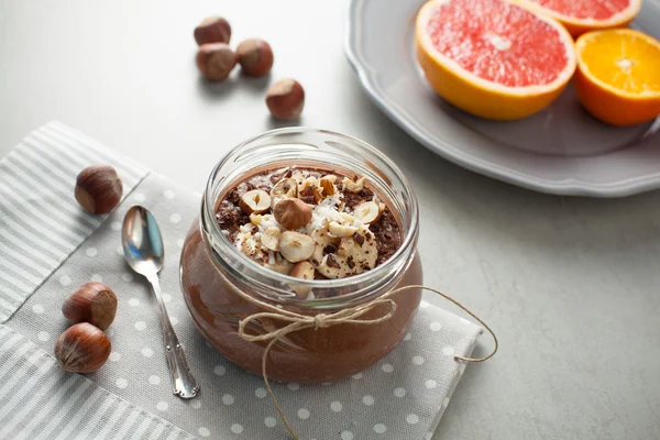 Buckwheat porridge with cocoa, hazelnuts and banana — Stock Photo, Image