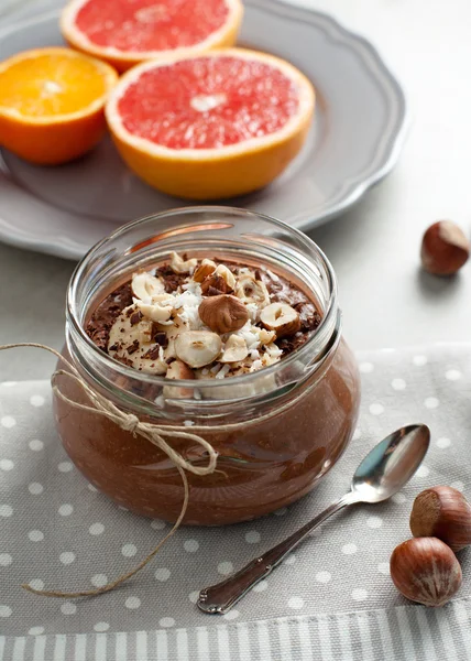 Buckwheat porridge with cocoa, hazelnuts and banana — Stock Photo, Image