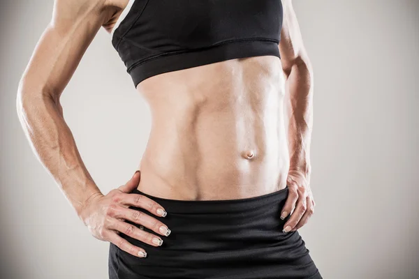 Muscular female body — Stock Photo, Image