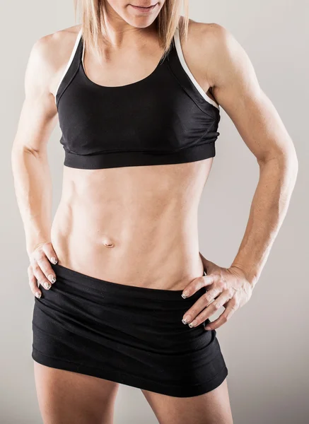 Muscular female body — Stock Photo, Image