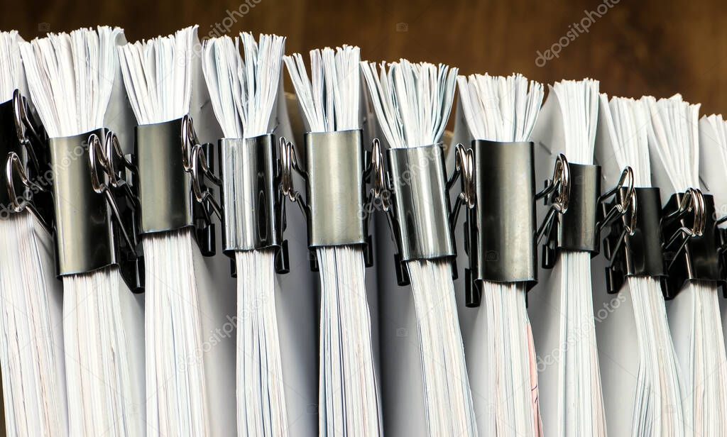 pile of paper documents in the office
