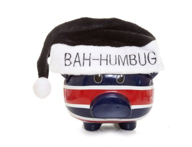 piggy bank wearing a scrouge bah humbug hat  clipart