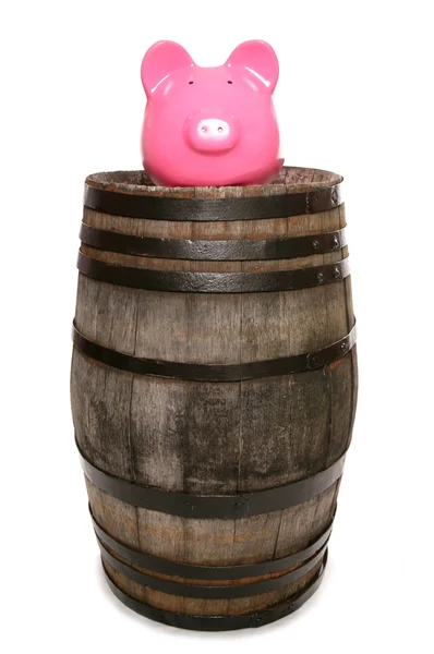 Old wine barrel and piggy bank — Stock Photo, Image