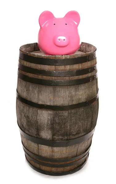 Old vintage oak wine barrel with piggy bank — Stock Photo, Image