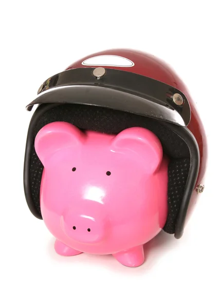 Piggy bank wearing a crash helmet — Stock Photo, Image