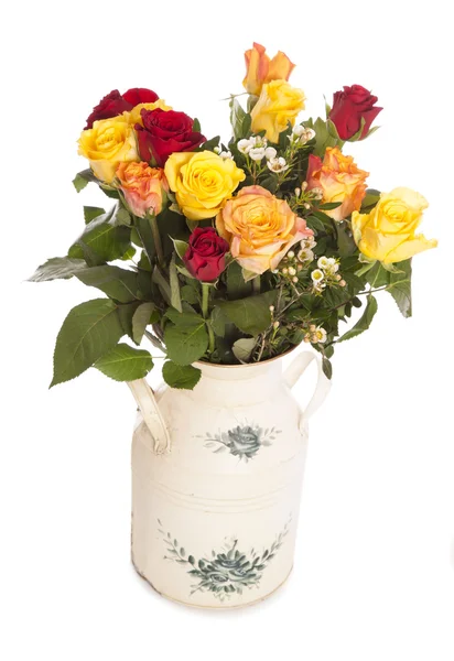 Roses in a shabby chic vase — Stock Photo, Image