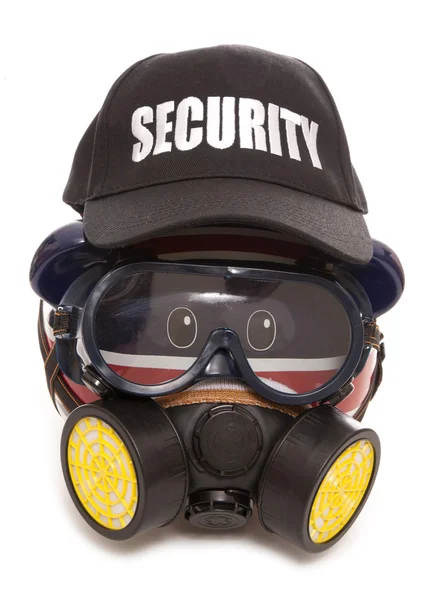 Piggy bank dragen gasmasker en veiligheid hoed — Stockfoto