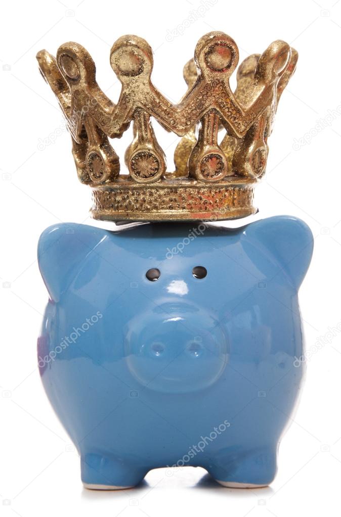 piggy bank wearing a crown