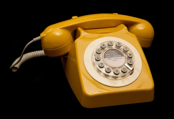 マスタードのレトロなスタイルの電話 — ストック写真