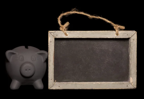 Black friday savings piggy bank and blackboard — Stock Photo, Image