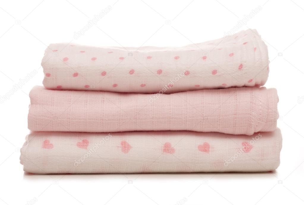 three pink baby muslins