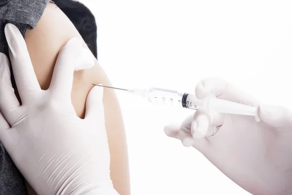 Doctor or Nurse holding a syringe give and injection — Stock Photo, Image