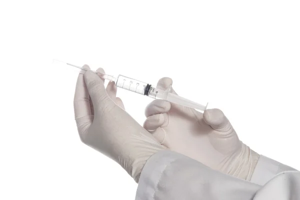 Hand holding syringe — Stock Photo, Image