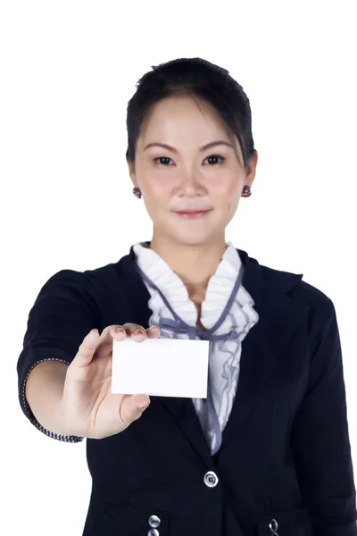 Business woman in black suit handing a blank business card — Stock Photo, Image