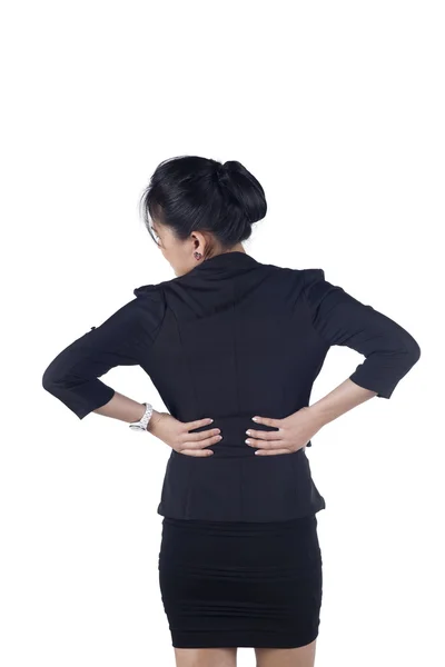 Zakenvrouw met rug pijn geïsoleerde witte achtergrond — Stockfoto