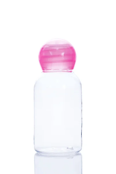 Empty plastic bottle with pink cap isolated on white background — Stock Photo, Image