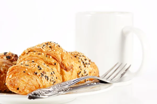 stock image Delicious croissant with a cup of black coffee