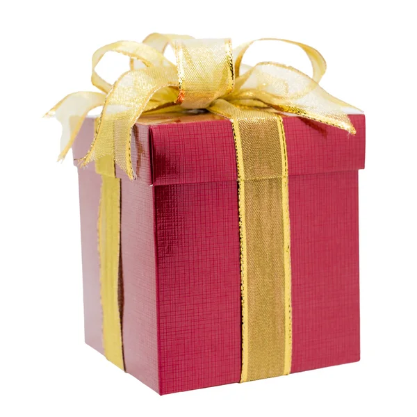 Red gift box with gold ribbon — Stock Photo, Image