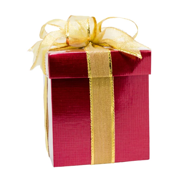 Red gift box with gold ribbon — Stock Photo, Image